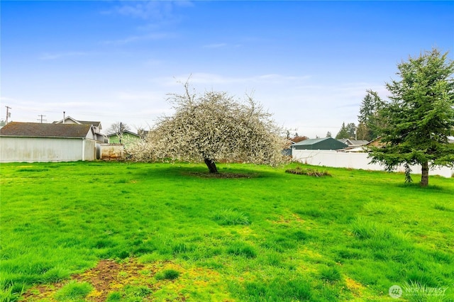 view of yard featuring fence
