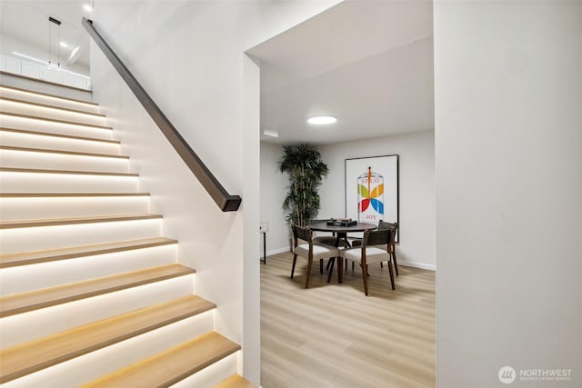 3115 103rd Ave NE, Bellevue, WA 98004 - stairs with wood finished floors and baseboards