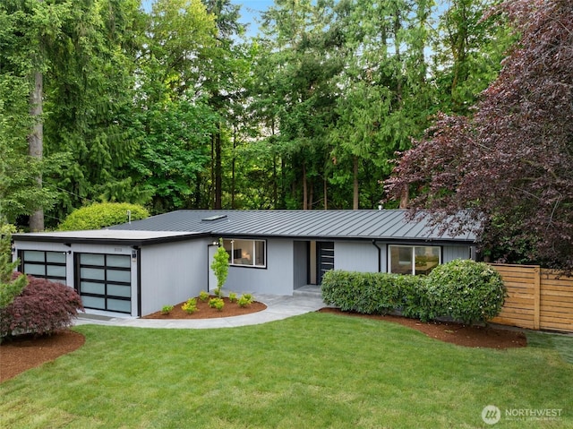 3115 103rd Ave NE, Bellevue, WA 98004 - view of front of house featuring a standing seam roof, metal roof, and a garage