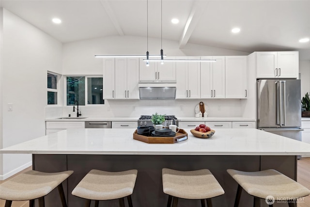 3115 103rd Ave NE, Bellevue, WA 98004 - kitchen featuring a sink, under cabinet range hood, white cabinets, light wood finished floors, and recessed lighting