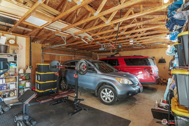 garage featuring a garage door opener