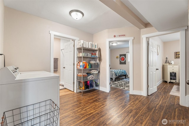 207 Harmon St, Waitsburg, WA 99361 - laundry area with washing machine and clothes dryer, dark wood-style floors, and baseboards