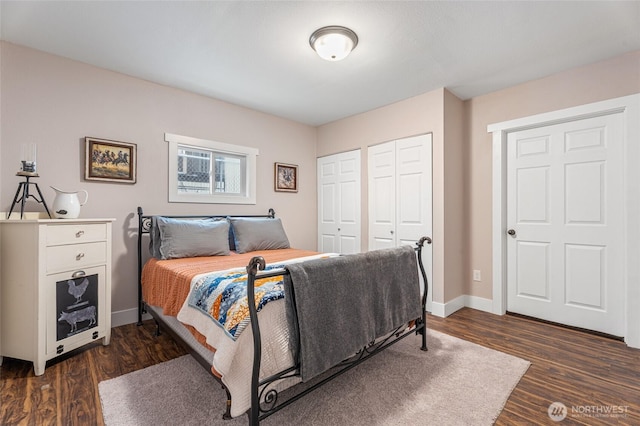 207 Harmon St, Waitsburg, WA 99361 - bedroom with dark wood finished floors, baseboards, and multiple closets
