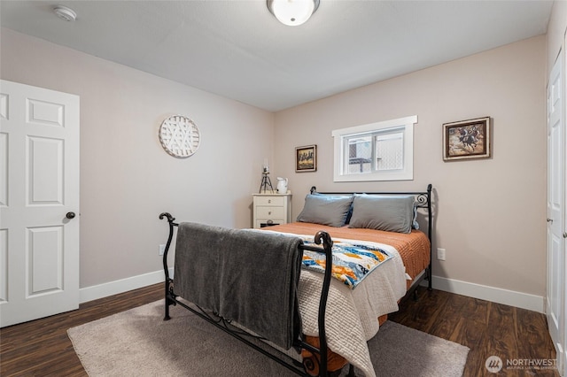 207 Harmon St, Waitsburg, WA 99361 - bedroom with baseboards and dark wood-style flooring