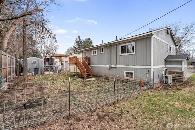 207 Harmon St, Waitsburg, WA 99361 - rear view of property with central AC, fence private yard, stairway, and a deck