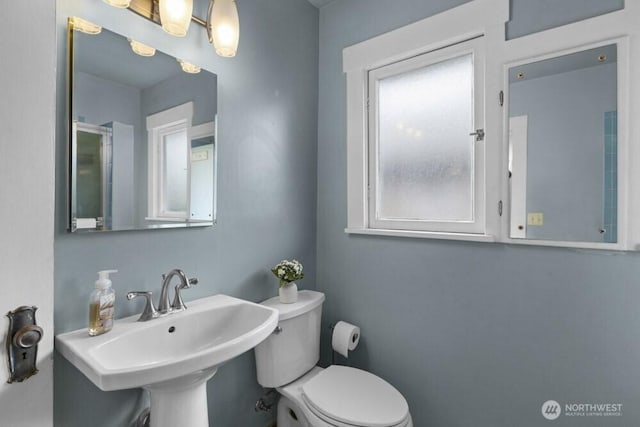 902 Wood Ave, Sumner, WA 98390 - bathroom featuring a sink and toilet