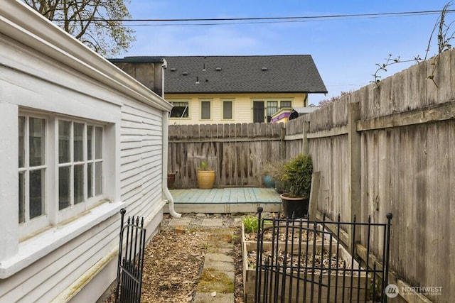 902 Wood Ave, Sumner, WA 98390 - view of patio with a deck and fence