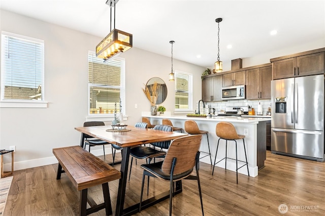 441 Lupine Ln SW, Ocean Shores, WA 98569 - dining area featuring baseboards, dark wood-style floors, and recessed lighting