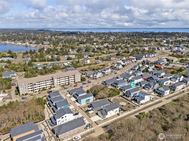 441 Lupine Ln SW, Ocean Shores, WA 98569 - drone / aerial view with a water view