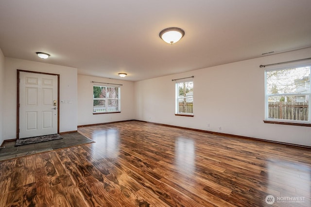 402 Easy St SE, Rainier, WA 98576 - interior space featuring dark wood-type flooring, baseboards, and visible vents