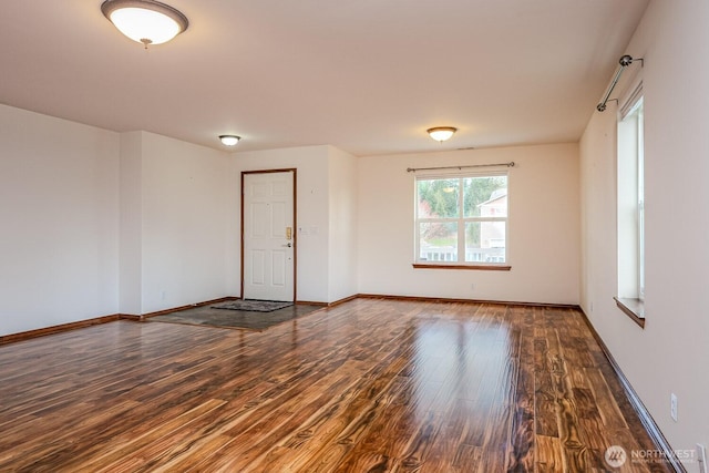 402 Easy St SE, Rainier, WA 98576 - empty room with baseboards and wood finished floors