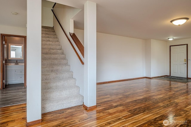 402 Easy St SE, Rainier, WA 98576 - staircase with baseboards and wood finished floors
