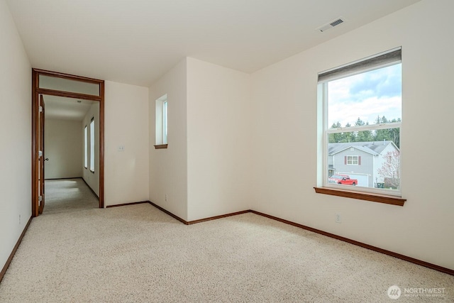 402 Easy St SE, Rainier, WA 98576 - unfurnished room with light carpet, baseboards, and visible vents