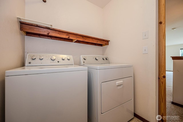 402 Easy St SE, Rainier, WA 98576 - laundry room with washer and clothes dryer and laundry area