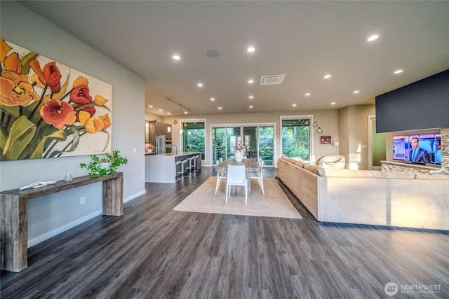 5469 Wood Duck Loop, Blaine, WA 98230 - living room featuring dark wood-style floors, recessed lighting, and baseboards