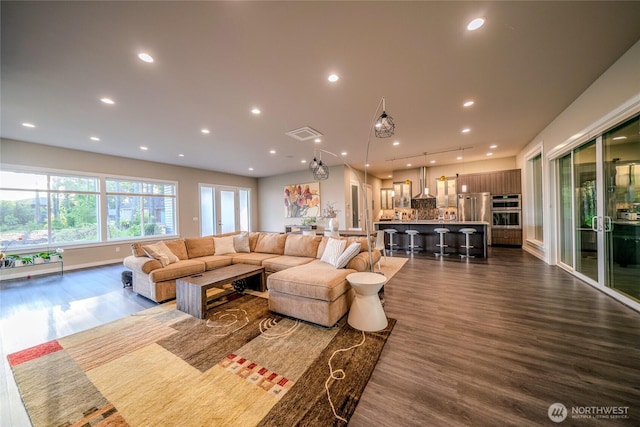 5469 Wood Duck Loop, Blaine, WA 98230 - living area with dark wood-style floors and recessed lighting