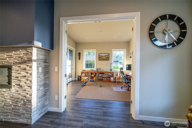 5469 Wood Duck Loop, Blaine, WA 98230 - hallway with wood finished floors, a desk, and baseboards