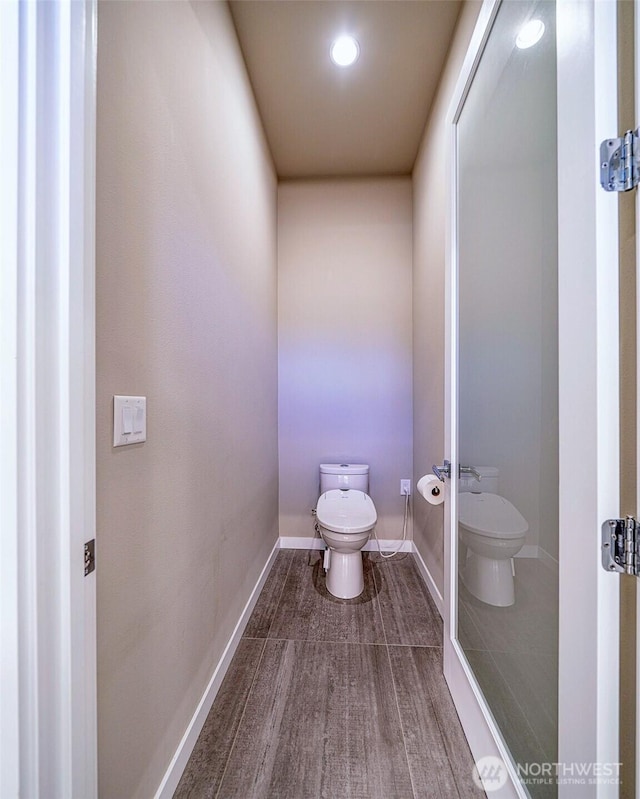5469 Wood Duck Loop, Blaine, WA 98230 - bathroom featuring toilet, baseboards, and recessed lighting