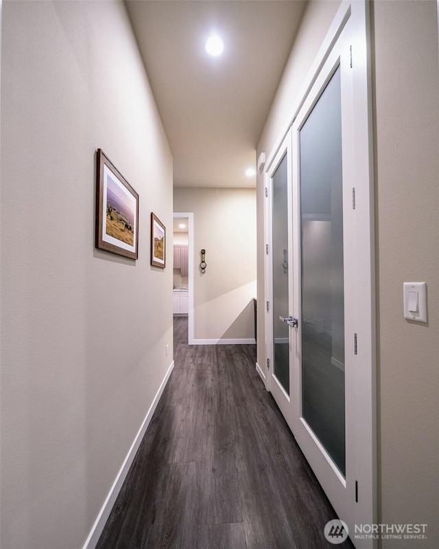 5469 Wood Duck Loop, Blaine, WA 98230 - hallway with dark wood-type flooring, baseboards, and recessed lighting