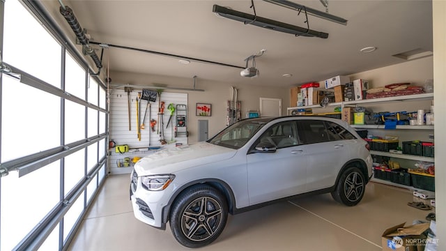 5469 Wood Duck Loop, Blaine, WA 98230 - garage featuring a garage door opener and electric panel