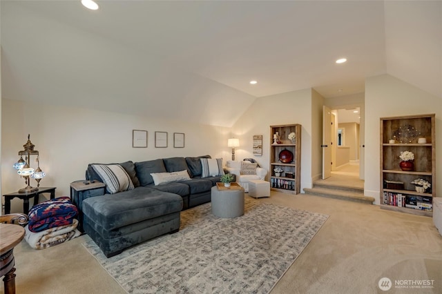 living room with recessed lighting, light colored carpet, and lofted ceiling