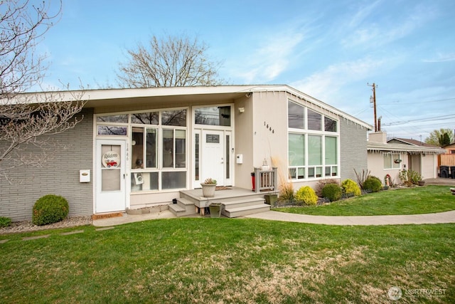 1444 SE Central Ave, College Place, WA 99324 - mid-century inspired home featuring brick siding and a front yard