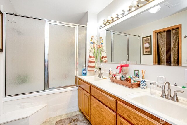 1444 SE Central Ave, College Place, WA 99324 - full bath with a shower with door, double vanity, a sink, and tile patterned flooring