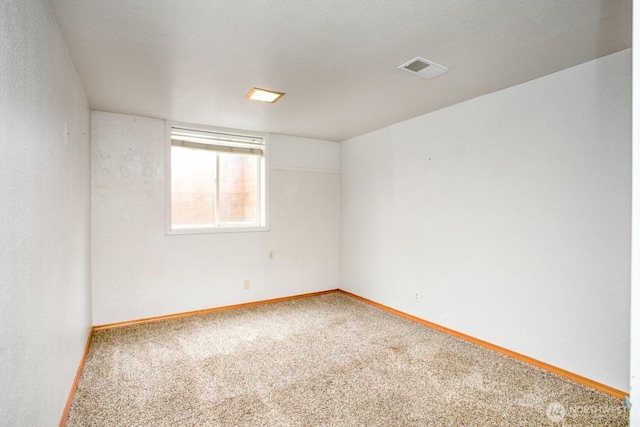 1444 SE Central Ave, College Place, WA 99324 - spare room with baseboards, visible vents, and carpet floors