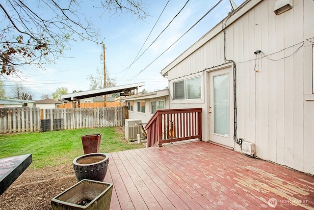 1444 SE Central Ave, College Place, WA 99324 - deck with central AC, fence, and a lawn