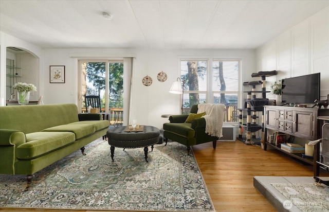 3800 Saratoga Rd, Langley, WA 98260 - living room with a decorative wall, light wood finished floors, and plenty of natural light