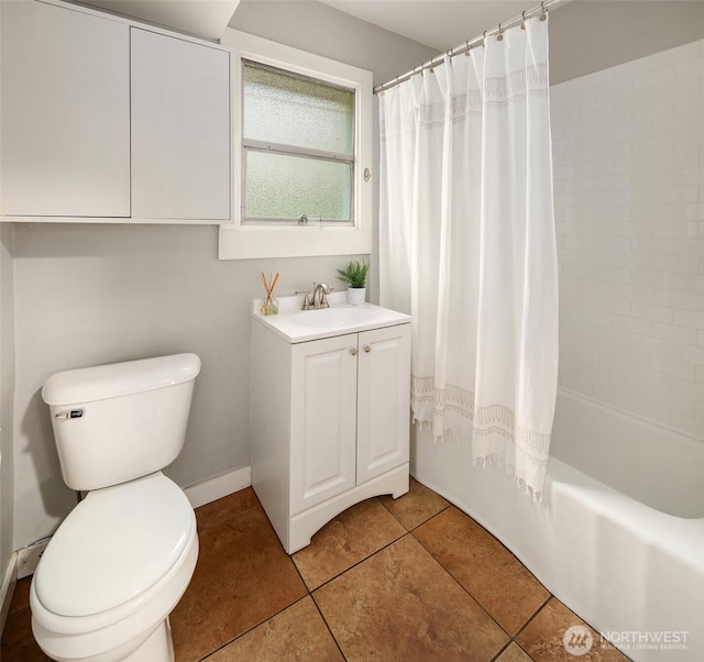 full bath with toilet, tile patterned floors, shower / tub combo, and vanity