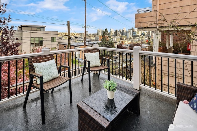 balcony featuring a city view