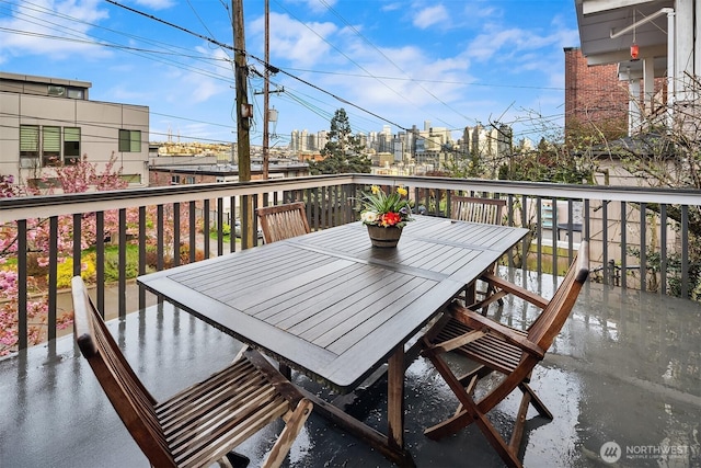 balcony featuring outdoor dining area