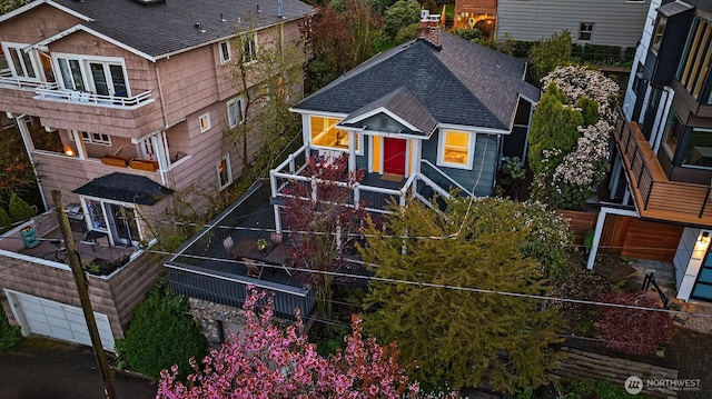 view of front of house with a shingled roof