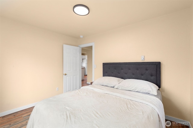1427 Garrison Ave, Port Orchard, WA 98366 - bedroom featuring baseboards and wood finished floors