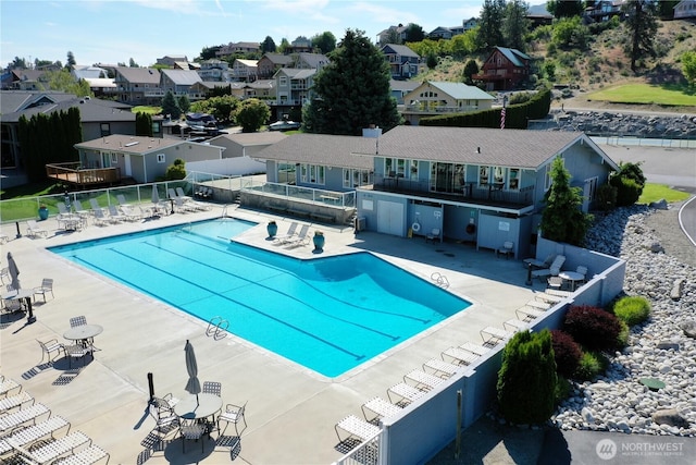 560 W Emerson Dr, Orondo, WA 98843 - community pool featuring a residential view and a patio
