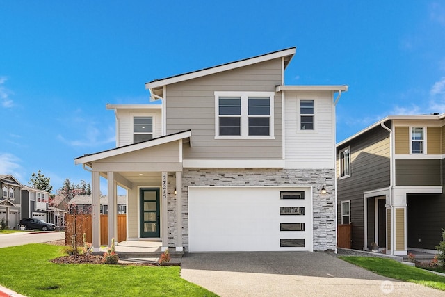 27215 106th Ave SE, Kent, WA 98030 - modern home featuring a front yard, driveway, stone siding, and an attached garage