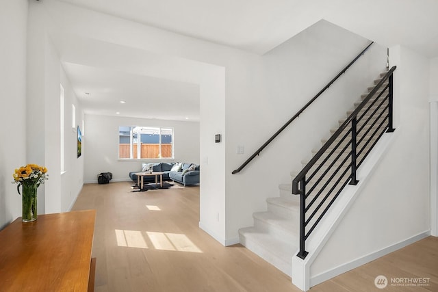27215 106th Ave SE, Kent, WA 98030 - staircase with baseboards, recessed lighting, and wood finished floors