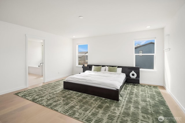 27215 106th Ave SE, Kent, WA 98030 - bedroom featuring recessed lighting, baseboards, and wood finished floors