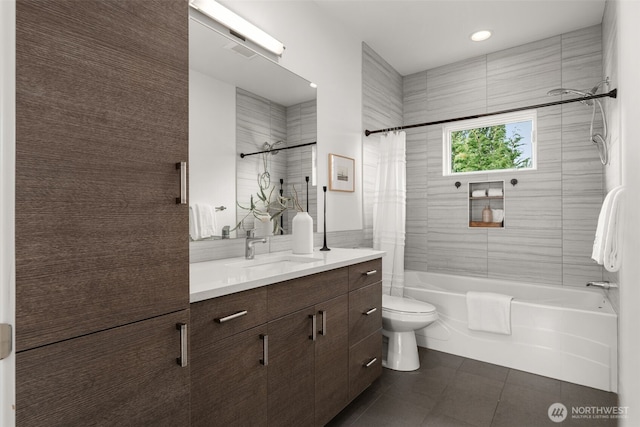bathroom with tile patterned floors, shower / bath combo, toilet, and vanity