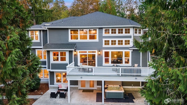 25935 SE 235th Way, Maple Valley, WA 98038 - rear view of house featuring a patio and a shingled roof