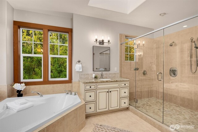 25935 SE 235th Way, Maple Valley, WA 98038 - full bathroom featuring a bath, a stall shower, vanity, and tile patterned floors