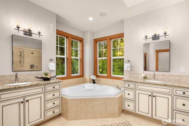 25935 SE 235th Way, Maple Valley, WA 98038 - full bathroom featuring a sink, plenty of natural light, and a garden tub