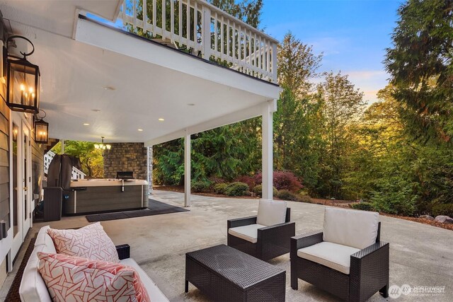 25935 SE 235th Way, Maple Valley, WA 98038 - view of patio with outdoor lounge area and a hot tub