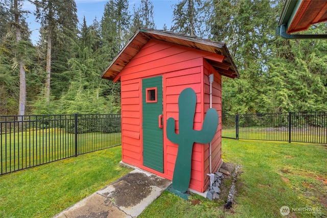 view of shed with a fenced backyard