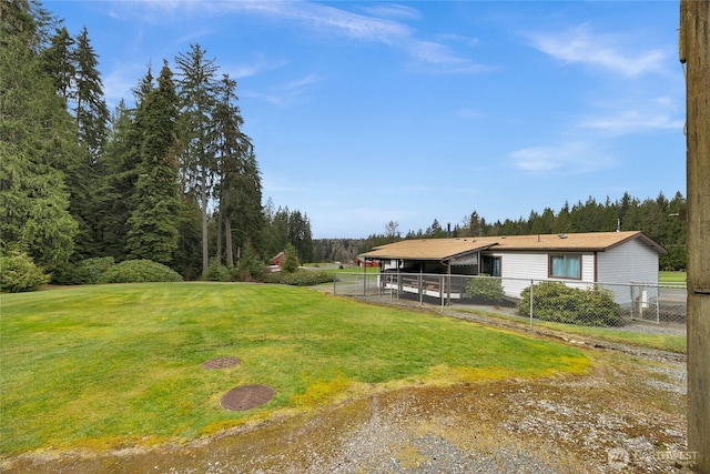 view of yard featuring fence