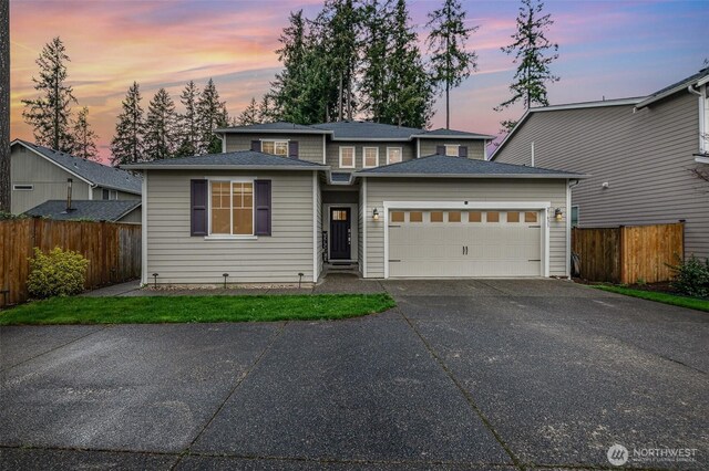 27631 154th Pl SE, Kent, WA 98042 - view of front of home featuring fence, a garage, and concrete driveway