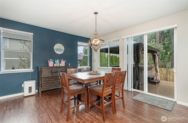 27631 154th Pl SE, Kent, WA 98042 - dining room with a notable chandelier, baseboards, and wood finished floors