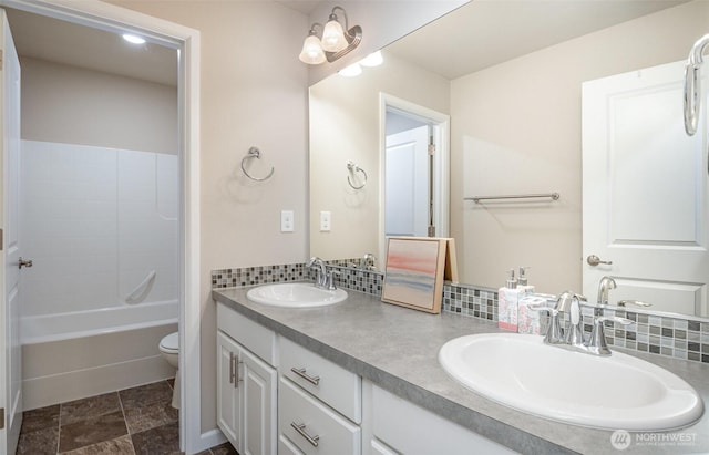 27631 154th Pl SE, Kent, WA 98042 - bathroom with double vanity, a sink, toilet, and backsplash