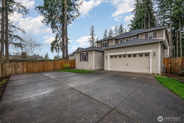 27631 154th Pl SE, Kent, WA 98042 - traditional home featuring driveway, a garage, and fence